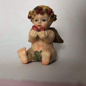 Cherubic Angel Figurine with Floral Accents